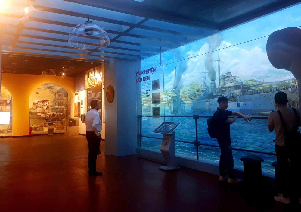 Visitors engage with the stories behind each exhibit, immersing themselves in the rich history and artistry on display
